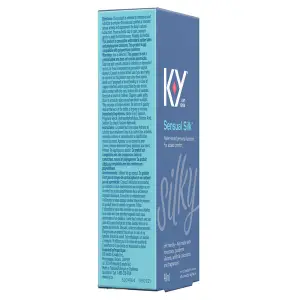 Tilted left and front sides of K-Y Lubricant - Sensual Silk Liquid box/Côtés gauche et avant d’une boîte de lubrifiant K-Y — Liquide Sensual Silk